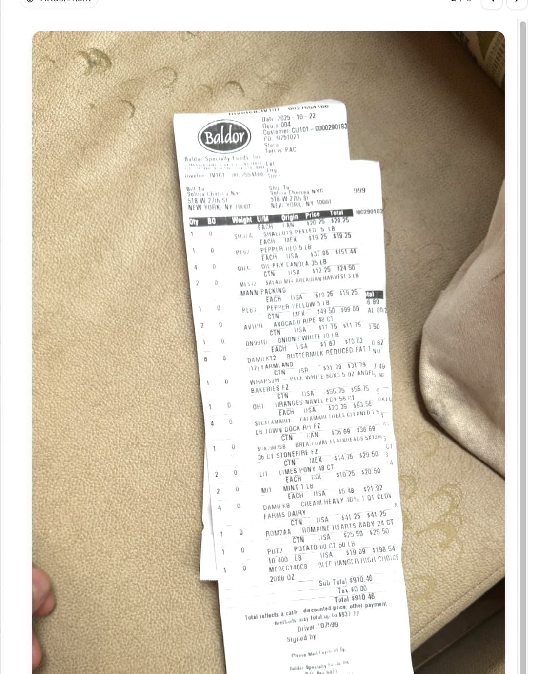 A Baldor distributor invoice photographed on a phone, shown inside Cleo Pay next to its extracted line items