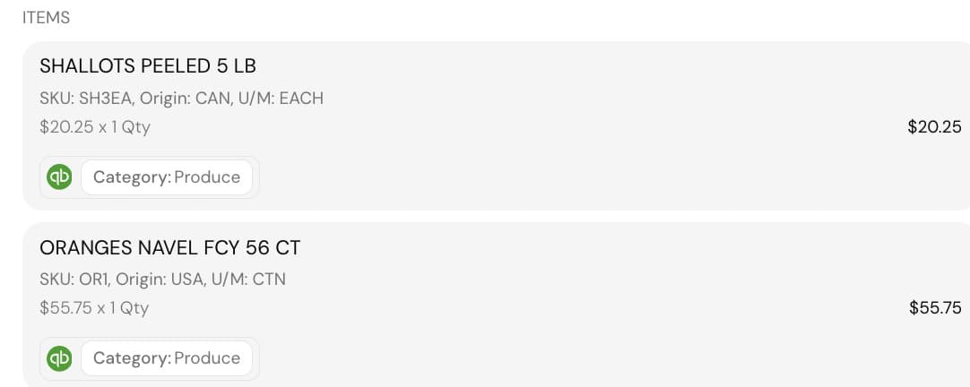 Scanned line items land with their QuickBooks category already attached.